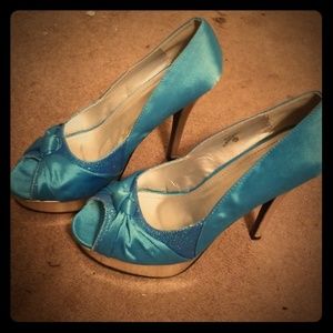 A pair of shoes that say let's party